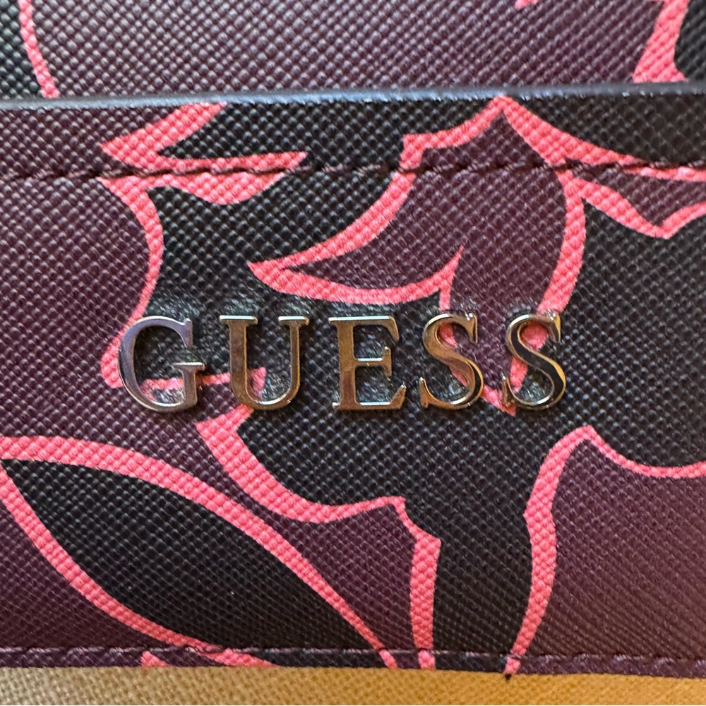 Guess Pink and Purple Floral wallet/wristlet.